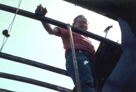 Dad pulling off cupola roof